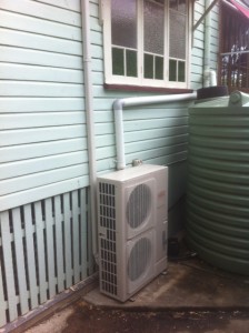 Outdoor unit of a 10kw Fujitsu ducted air conditioner positioned neatly and out of the way